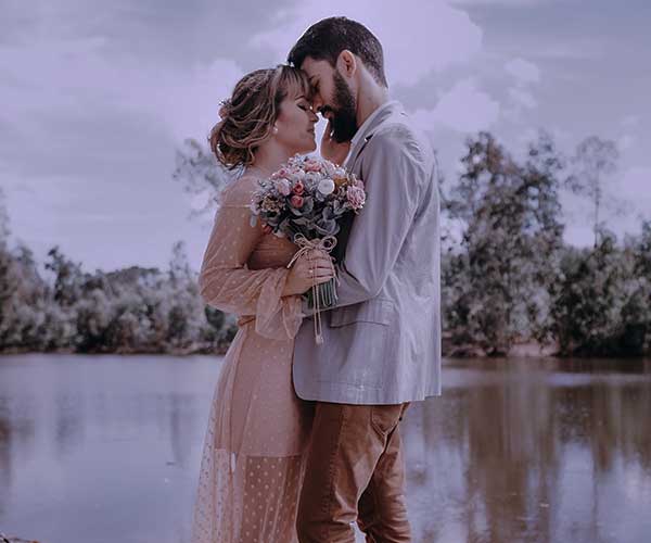 Couple standing on dock mvas wedding photo editing before visual
