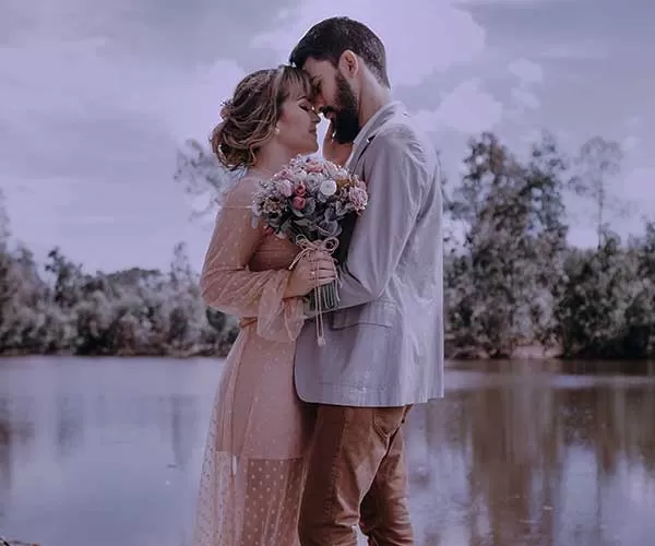 Couple standing on dock mvas wedding photo editing before visual
